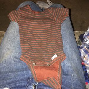 A boy onsies and newborn and cotton